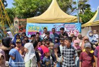 Sejumlah anak yatim saat menikmati wahana bermain gratis. (Madurakita.com)
