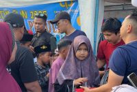 Suasana pasar rakyat di Pamekasan bersama ratusan anak yatim (Madurakita.com)